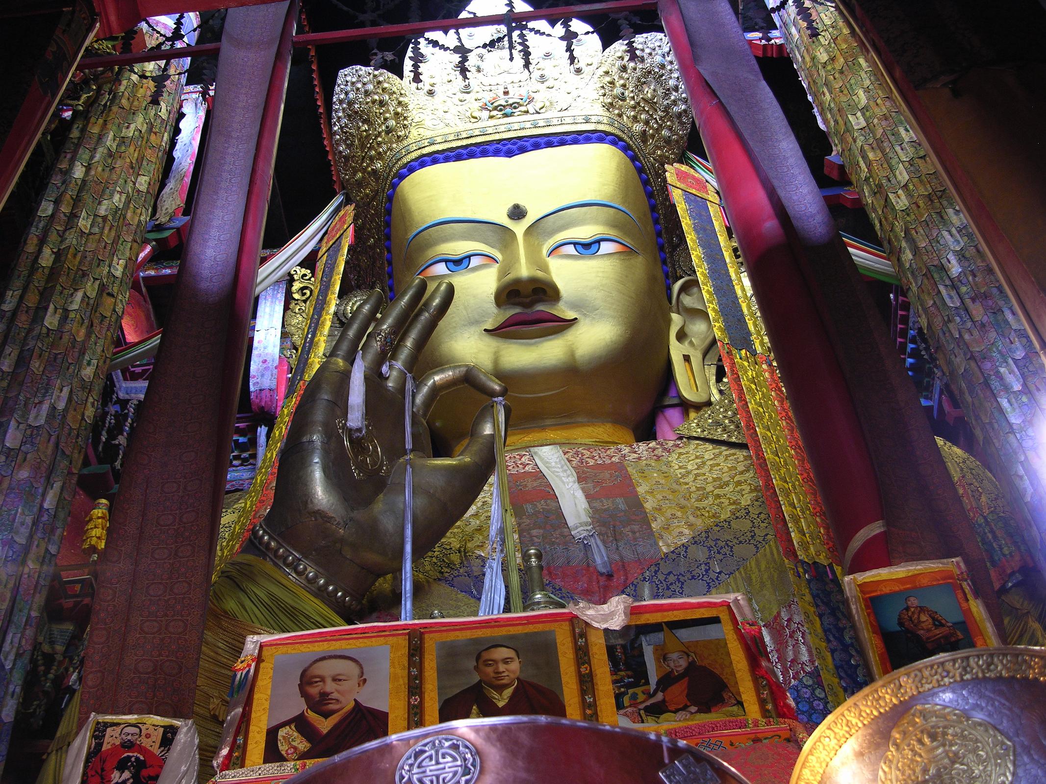 Tibet 07 02 Shigatse Tashilhunpo 26.2m Maitreya The most impressive Tashilhunpo sight is the Maitreya Chapel, a tall red building with a gold roof at the complex�s northwestern corner, built in 1914 by the ninth Panchen Lama. It houses a 26.2m image of Maitreya, the Future Buddha, whose ears are 2.6m long and each finger 1.2m. The statue contains 279kg of gold and 150,000kg of copper and brass molded on a wooden frame.